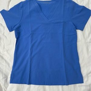 Mandala scrub set in ceil blue. Medium top large bottom tags attached.